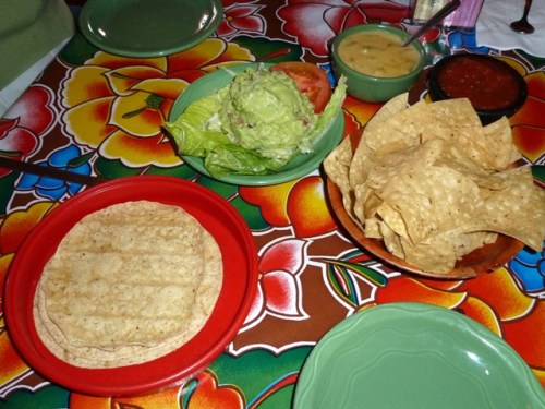 Tostada Chips, Salsa (spicy), Corn Tortillas, and other appetizers on display