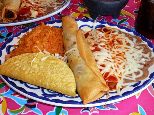 Combination Plate — rice, frijoles, red enchilada, meat and potato taco, beef chimichanga