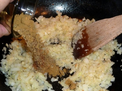 Add oregano, cumin, and cinnamon — toast until fragrant while stirring constantly