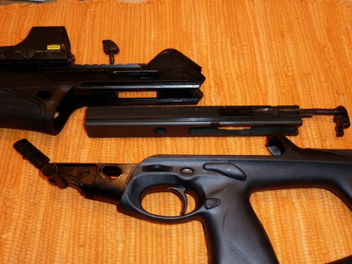 Remove the charger handle and slide out the bolt