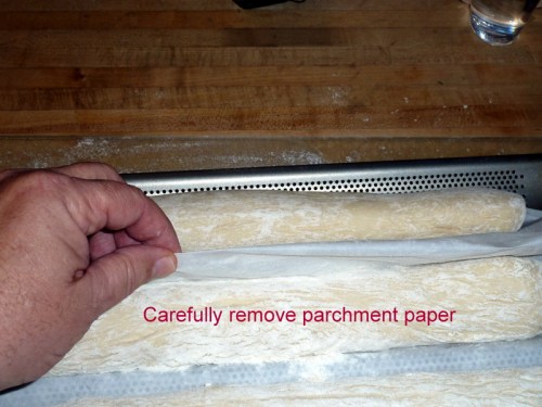 Carefully remove parchment paper after the rise