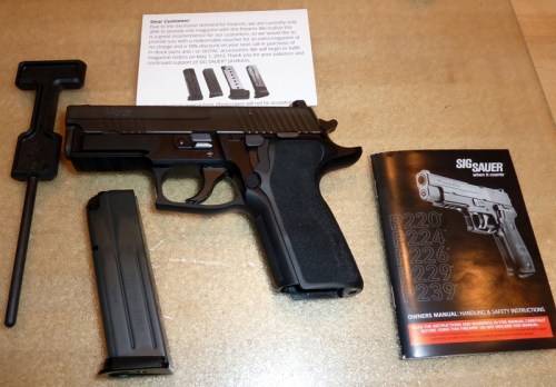 Included E² grip removal tool on left side of image