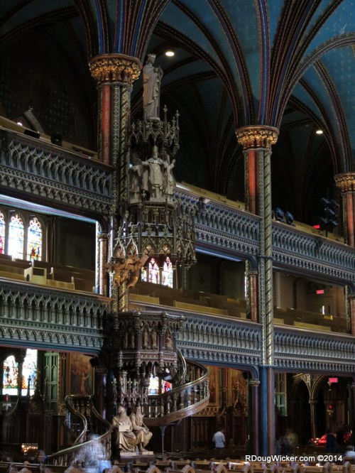 Ezekiel and Jeremiah sit at the base of the pulpit