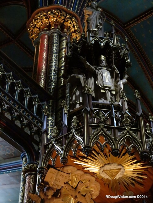 Saint Leo the Great overlooking the congregation from above the pulpit