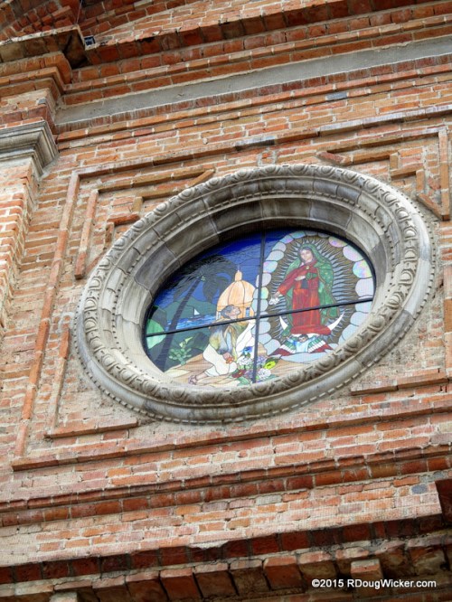 Stained glass set in old brick