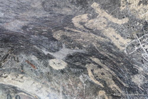 Ancient Pictographs alongside more recent Historical Inscriptions and destructive graffiti